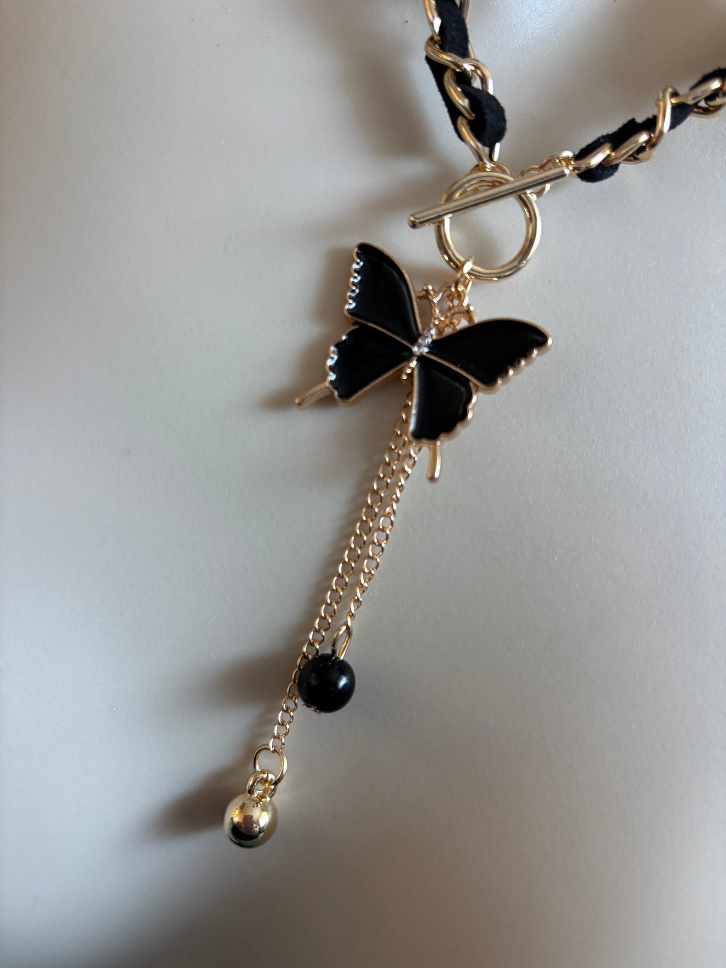 Elegant Black Butterfly Pendant Necklace with Golden-Tone Chain